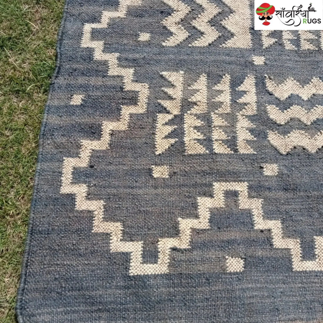 Handmade wool and jute kilim rug with tribal geometric motifs