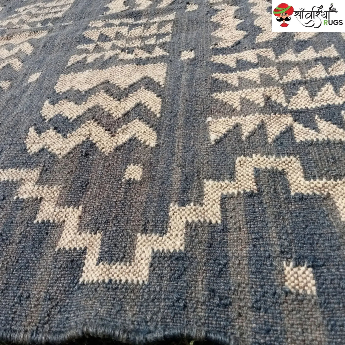 Handmade wool and jute kilim rug with tribal geometric motifs