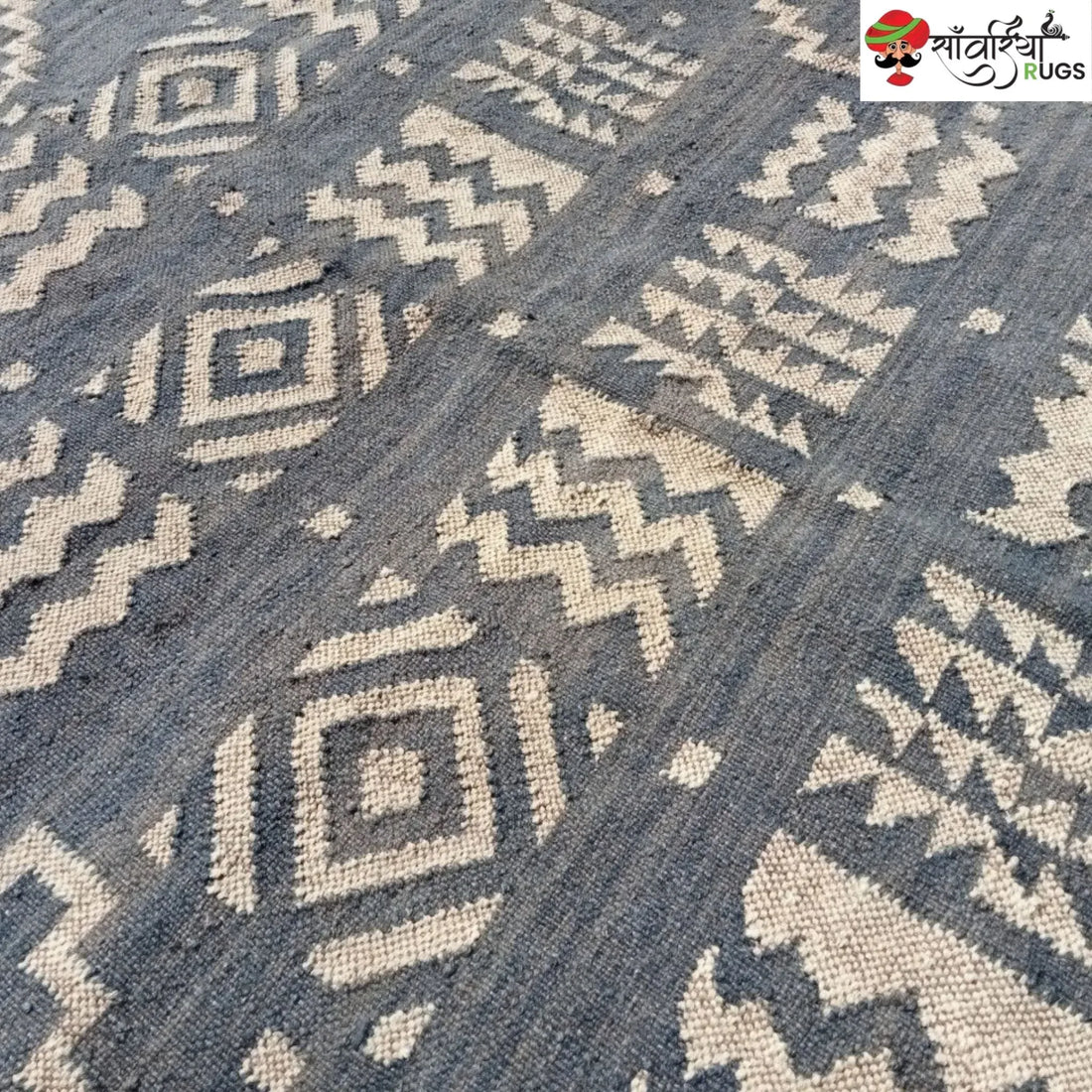 Handmade wool and jute kilim rug with tribal geometric motifs