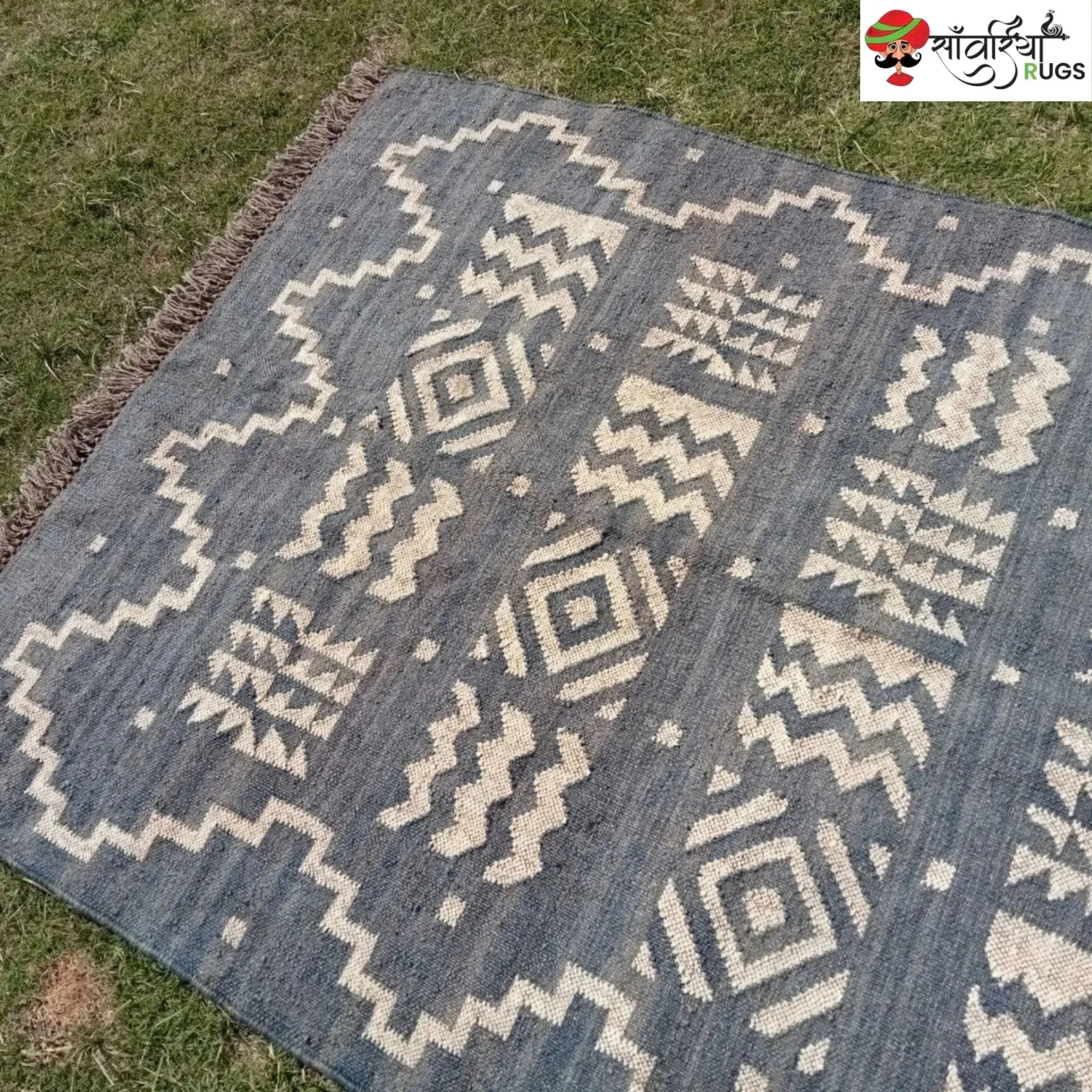 Handmade wool and jute kilim rug with tribal geometric motifs