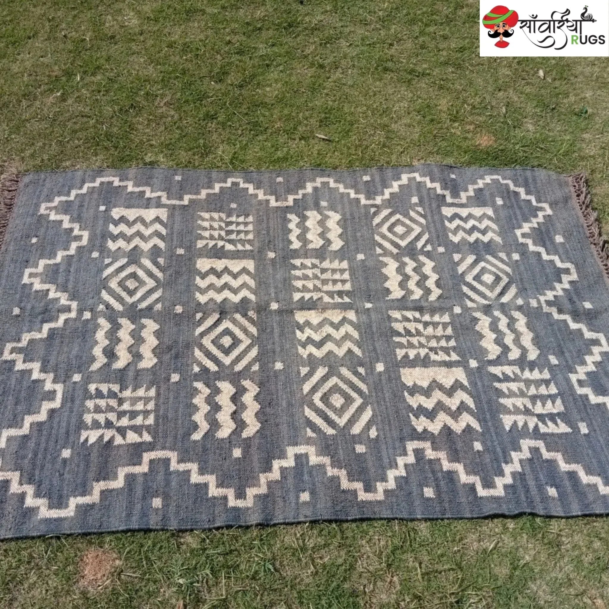 Handmade wool and jute kilim rug with tribal geometric motifs