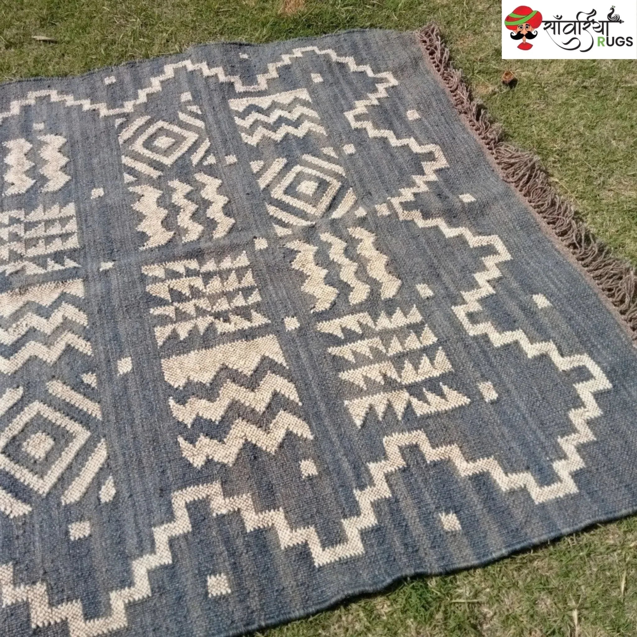 Handmade wool and jute kilim rug with tribal geometric motifs