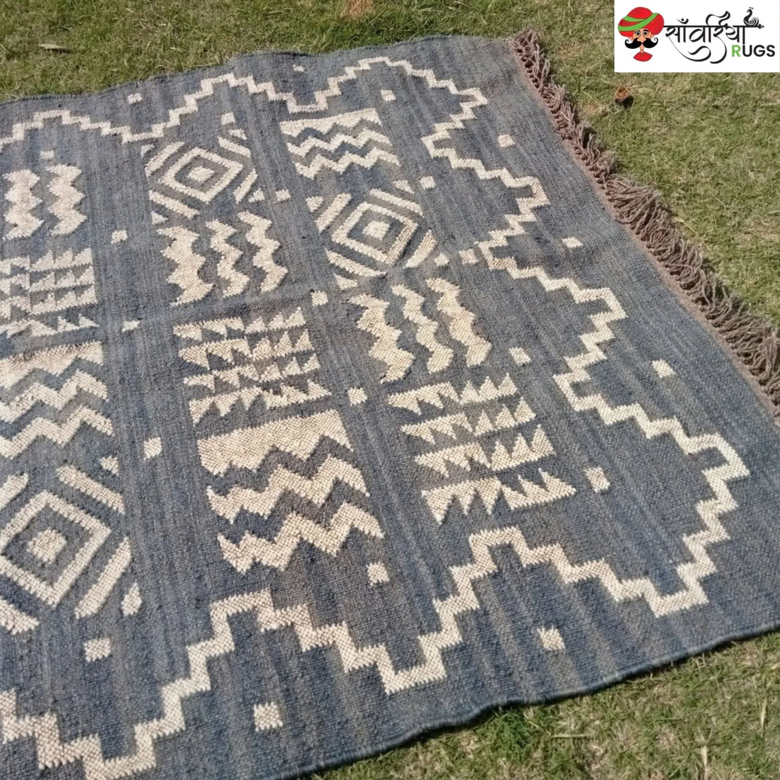 Handmade wool and jute kilim rug with tribal geometric motifs