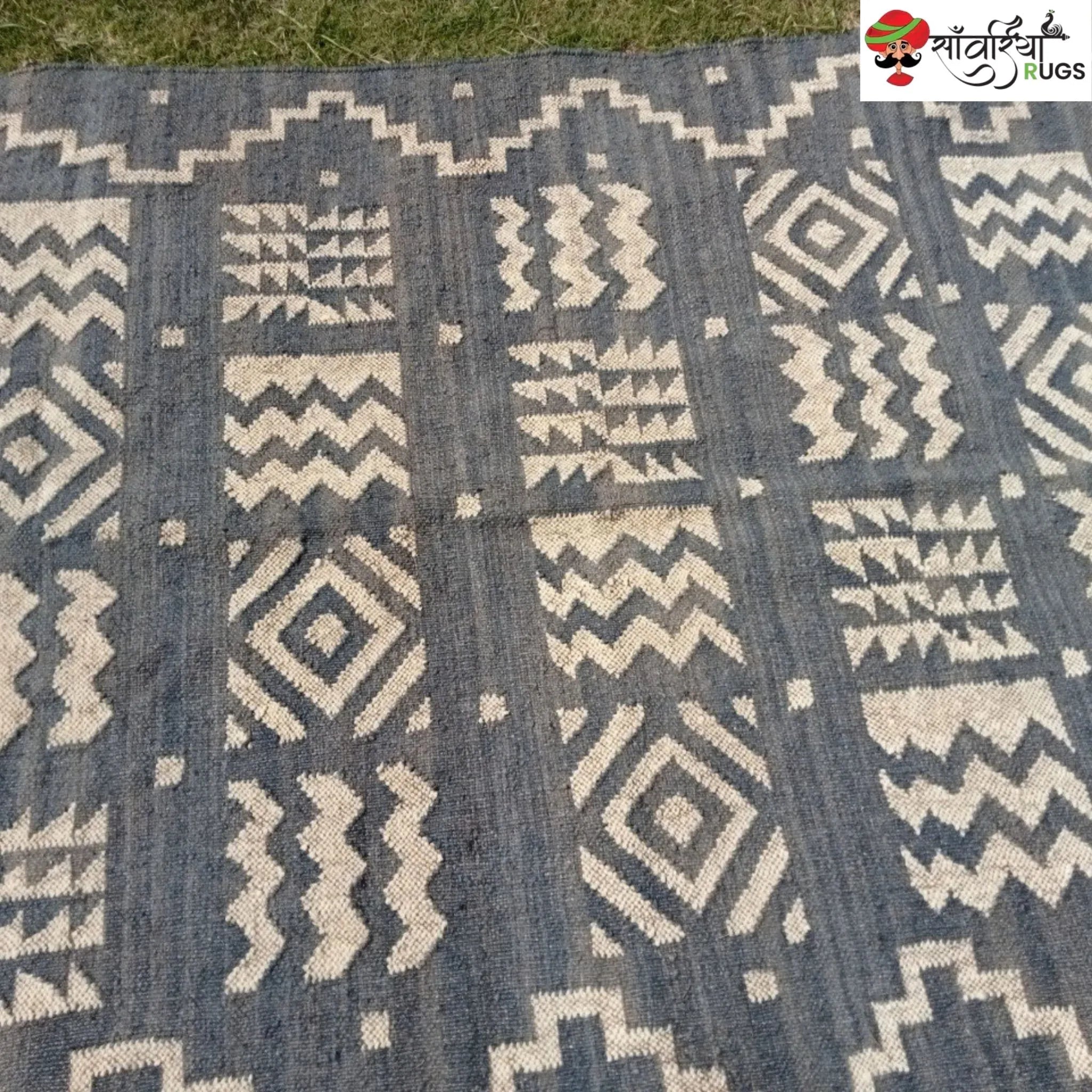 Handmade wool and jute kilim rug with tribal geometric motifs